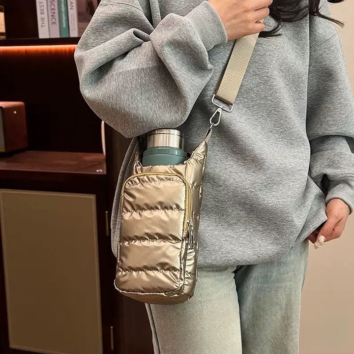 The Voyager Puffer Sling™ Premium Insulated Bottle Carrier Bag – Quilted Water Bottle Sling with Adjustable Shoulder Strap, Lightweight Puffer Bottle Holder, Drawstring Closure & Front Pocket for Travel, Office, Gym & Everyday Use