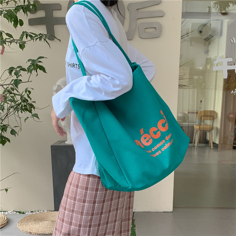 mecci Tote Bag