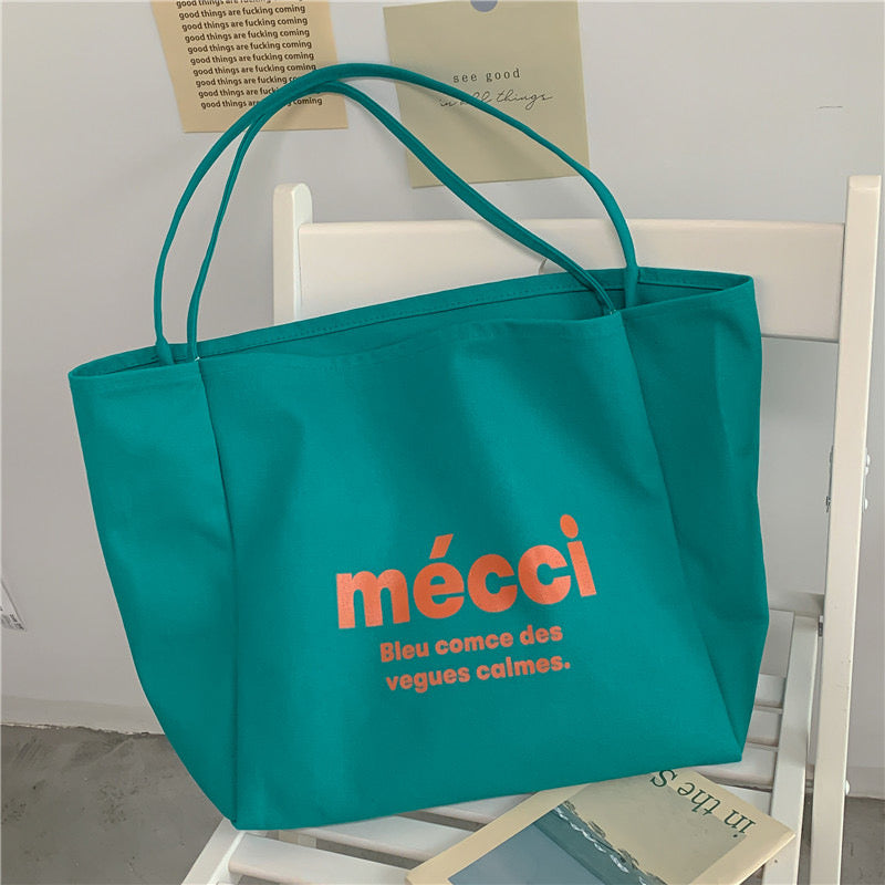mecci Tote Bag