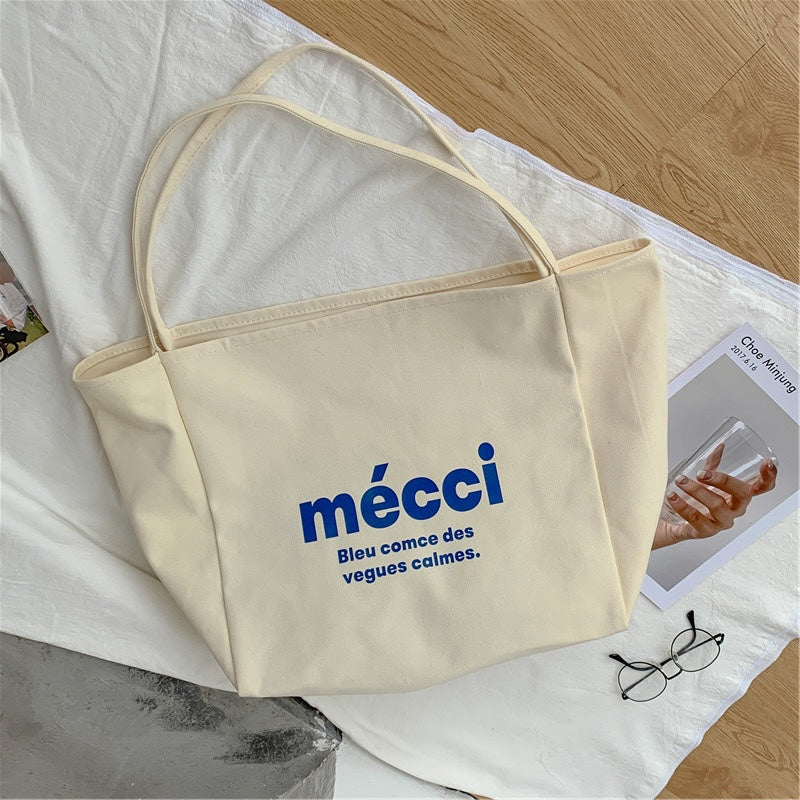 mecci Tote Bag