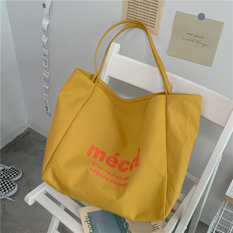 mecci Tote Bag